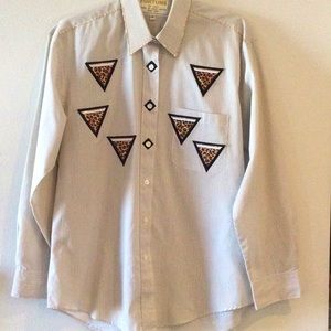 Women’s med long sleeved button down blouse with gold accents. Gently worn.